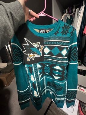 Teal Geometric Pattern Sweater with Ice Hockey Motif
